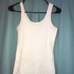 Maurice’s white tank top